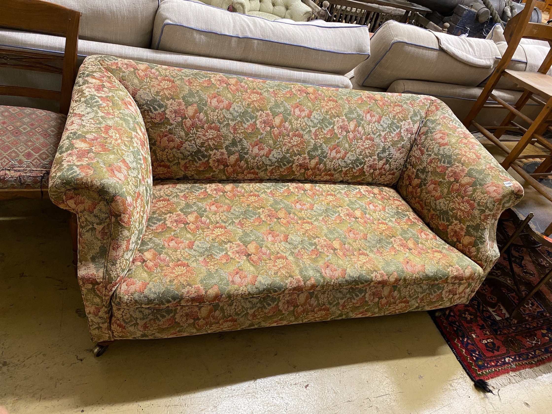 A 1920's two seater sofa, length 170cm, depth 80cm, height 70cm